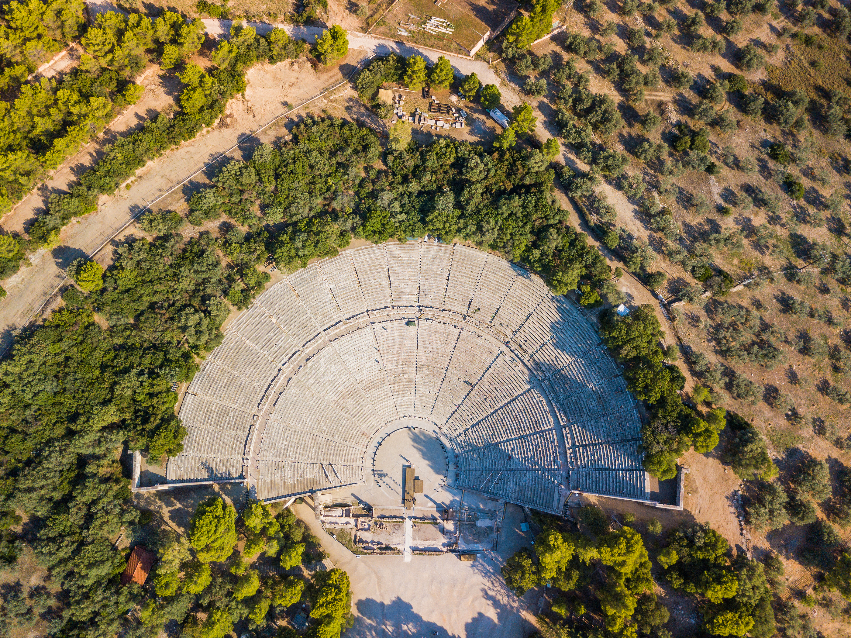 bigstock-Ancient-Amphitheater-Of-Epidau-255006694.jpg