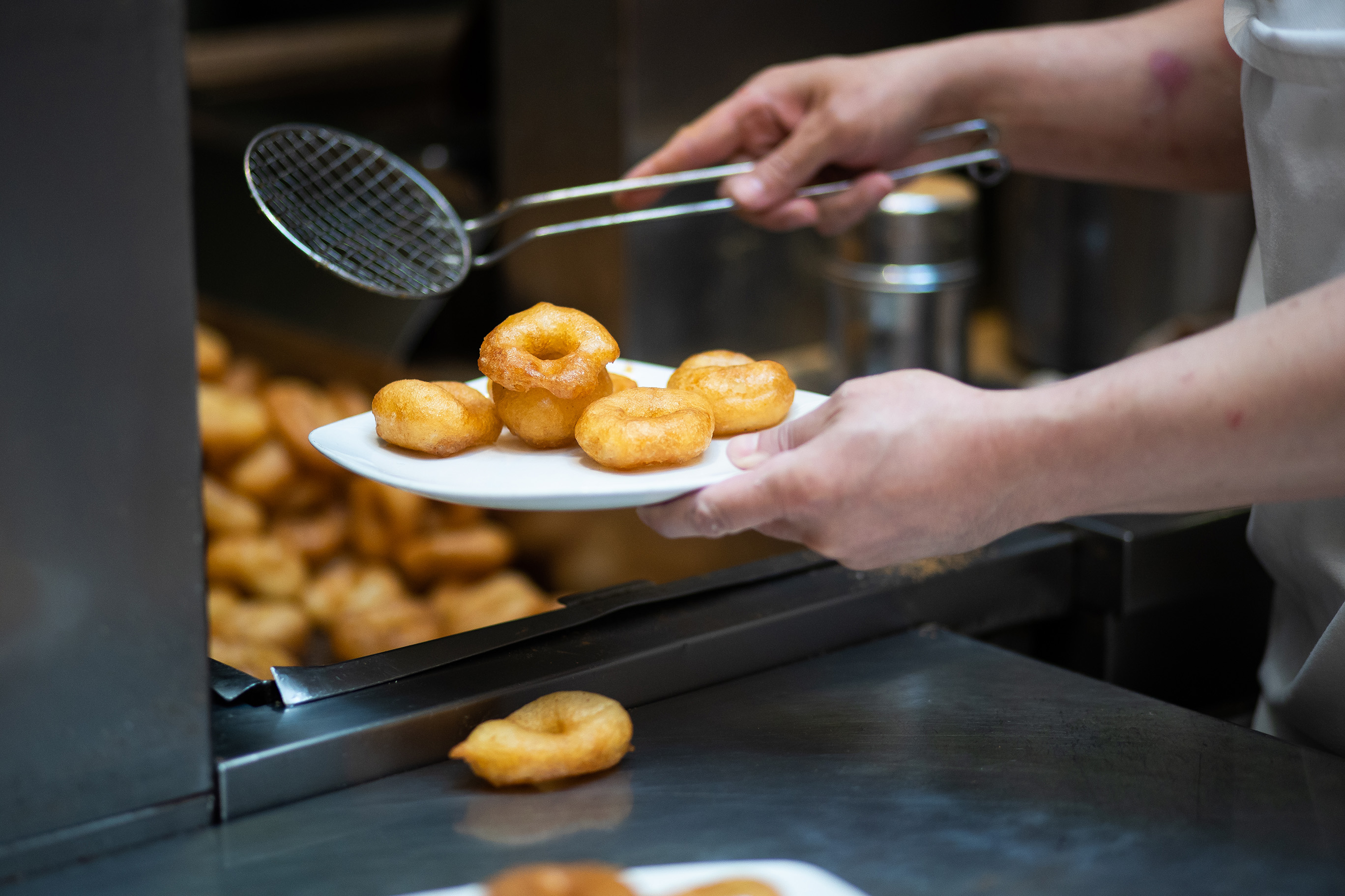 Try traditional loukoumades—golden, honey-drenched Greek doughnuts.